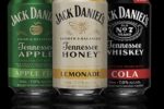 Cans of Jack Daniel''s beverages, featuring Tennessee Apple, Tennessee Honey Lemonade, and Tennessee Whiskey & Cola.